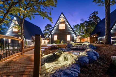 Vapors in Hot Springs, AR! Modern A-frame cabin featuring a private heated pool, cold plunge, cedar barrel sauna, mini-golf, and fire pit.